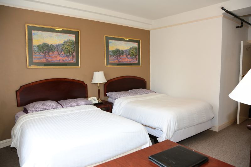 Nash Hotel 2 double beds with private bathroom